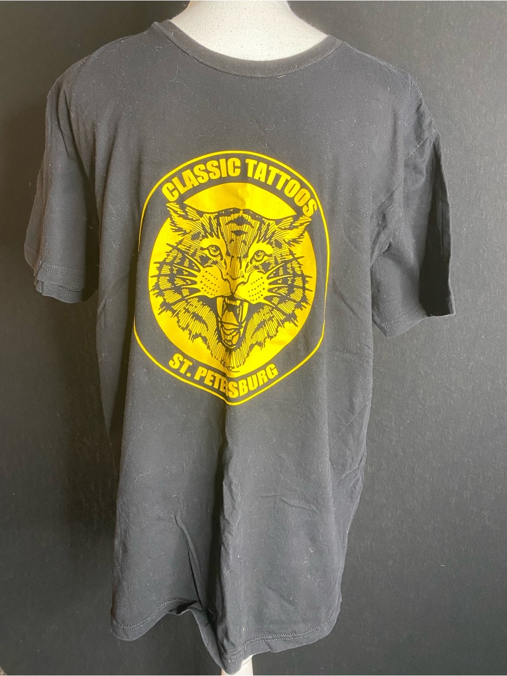 Next Level Apparel Black Tee with Yellow Classic Tattoos St. Petersburg Graphic